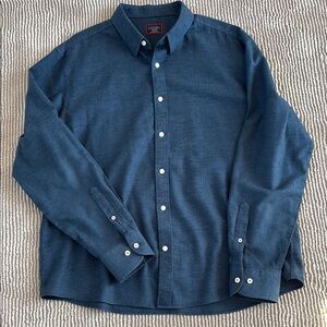 Men's dark blue UNTUCKit dress shirt.